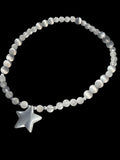 White Catseye Glass Star Focal Bead 
Paired with Selenite and Clear Quartz Crystal Beads 