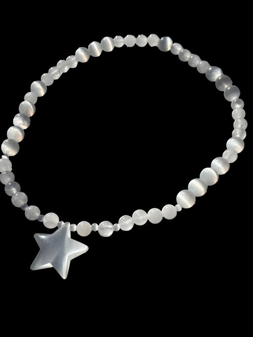 White Catseye Glass Star Focal Bead 
Paired with Selenite and Clear Quartz Crystal Beads 